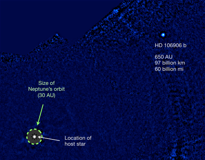 HD 106906 b: A planetary-mass companion outside a massive debris disk