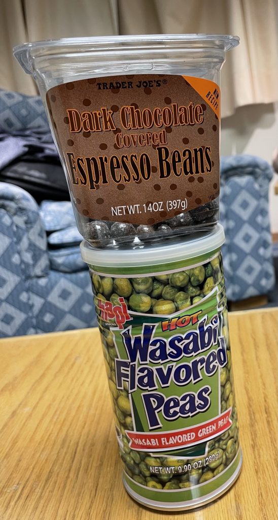 Uh oh, two nights to go and the wasabi peas and dark chocolate covered pretzels are already gone. Jared is extraordinarily pleased by his invention of mixing the beans and peas.