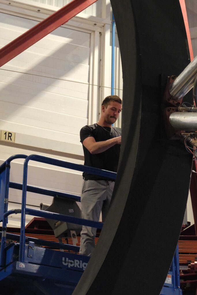 Who's taller, Adam on the platform or Parker on the scissor lift?