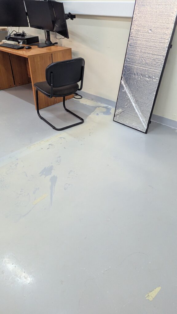 it might have been contained by our mess of extension cords behind the desk