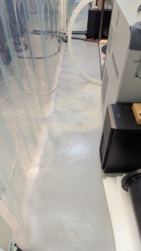 came out from the wall behind the chiller